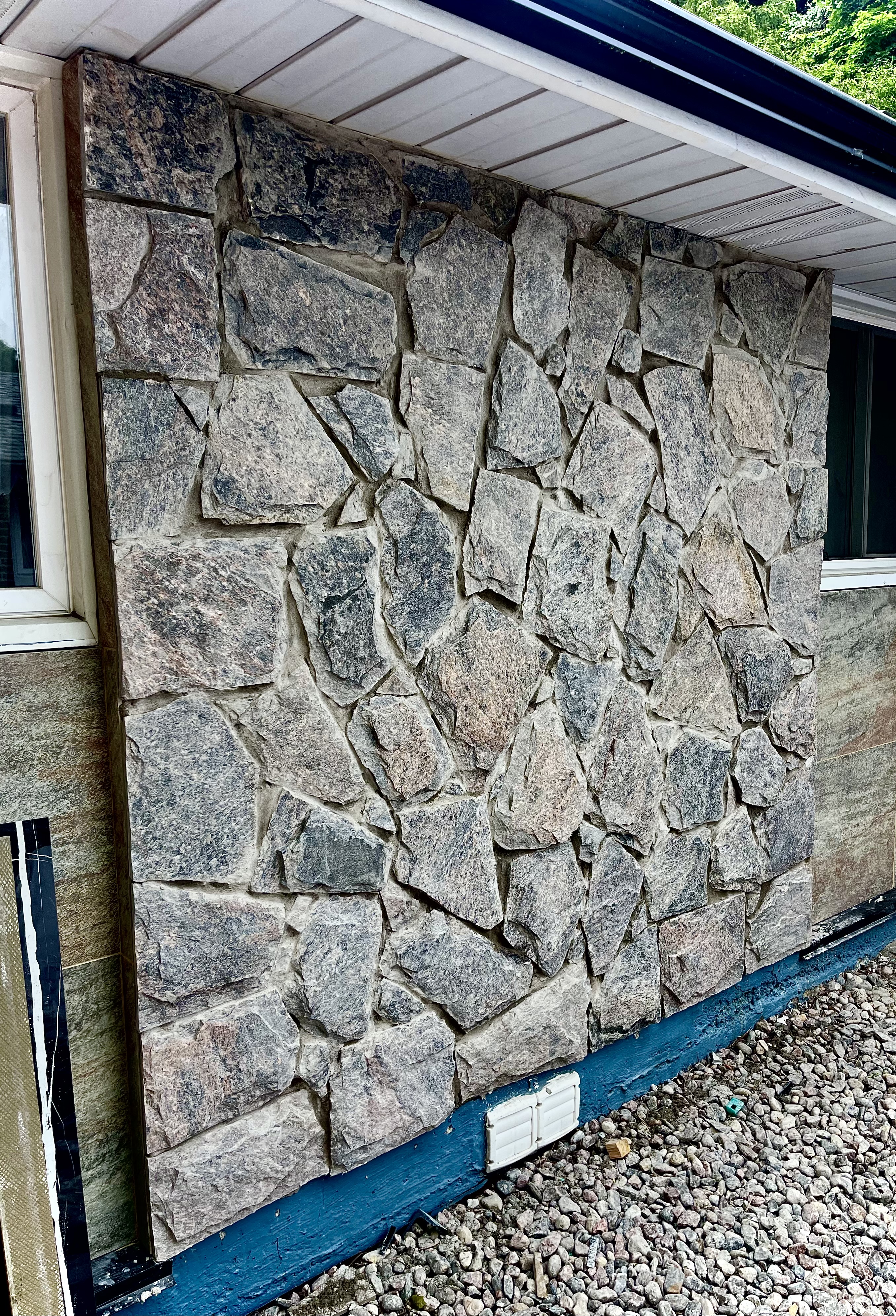 Stone veneer exterior renovation detail